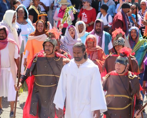 Jesus is being escorted by soldiers after being arrested in the Garden of Gethsemane.